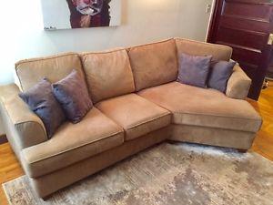 Sectional sofa with cuddler