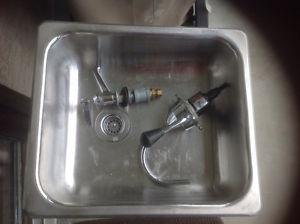 Stainless steel sink 12" x 14" with pump and tap..$