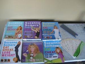 WHOLE lot of cookbooks by Suzanne Somers! I lost over 50