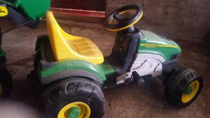 child's small John deere pedal tractor