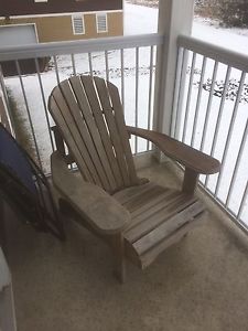 2 wood adirondack chairs