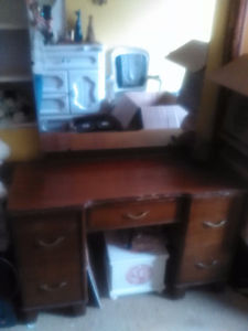 Brown antique dresser with mirror