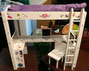Dolls bed with desk.