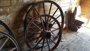 Large antique wooden wagon wheels