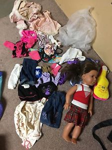 Newberry doll and extra clothes