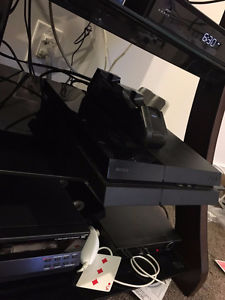 PS4, 4 games, 2 controllers & charging dock