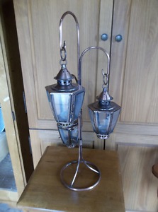 Three lanterns for candles with stand