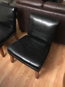 Wanted: 2 black leather comfy chairs