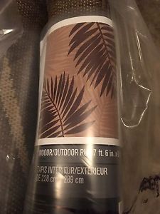 Brand new Indoor/Outdoor rug palm tree