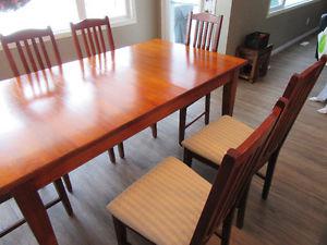 Extendable Solid Timber Dining table with 8 chairs