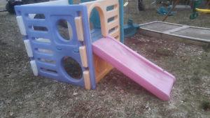 Outdoor climber with slide