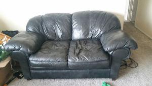 Very comfy leather love seat