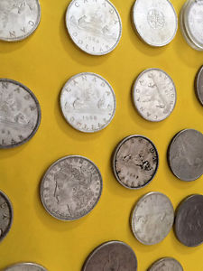 Wanted: WE BUY OLD SILVER DOLLARS_ JEWELRY_ ANTIQUES