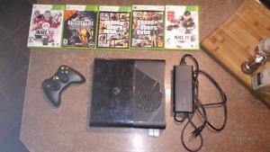 Xbox 360 e 4gb with games and remote