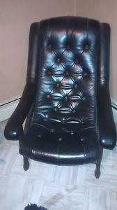 's black leather captains chair