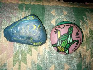 2 hand painted rocks