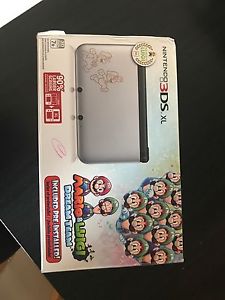 3DS XL, w pre installed Mario game & comes with a lego game