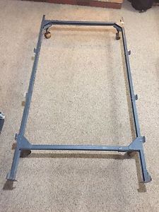 Adjustable bed frame with wheels
