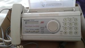 Fax machine with telephone