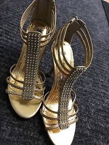 Gold strappy heels