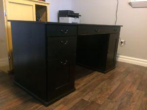 IKEA black wooden desk with drawer storage