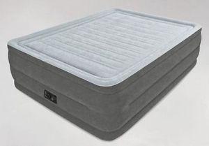 Queen size airbed, 22" tall.