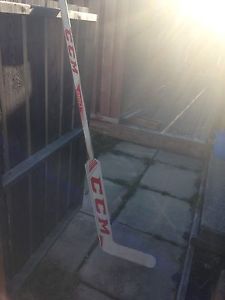 Red and white ccm goalie stick