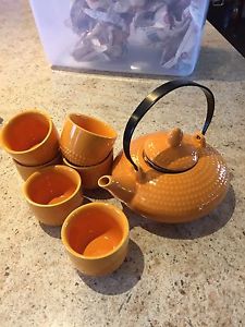 Small tea pot and cups