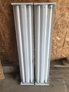 Two Lithonia Strip Fluorescent Lights
