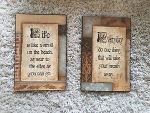 Two wooden wall hangings