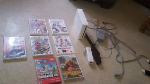 Wii with 7 games, 2 controllers and 1 nunchuck for sale!