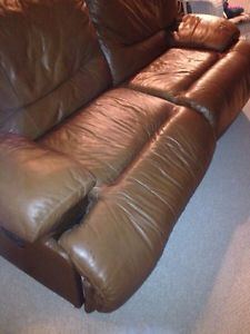 Free leather couch in ok condition