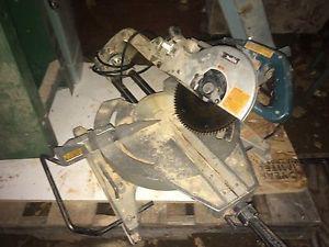 Tilting sliding compound mitre saw