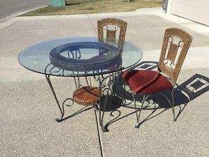 Wrought Iron Table and four Chairs