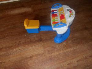 fisherprice musical toy with built in chair
