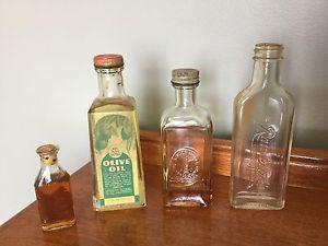 4 Antique Bottles - Oil Singer Rawleigh's