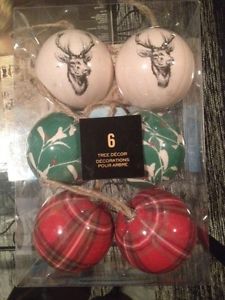 4 boxes of Holiday Decorations (Not used/unopened)