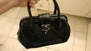 Black hand held purse