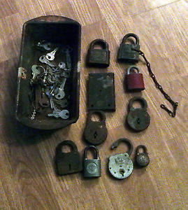 Container full of old locks and keys