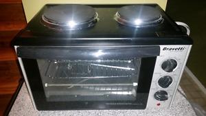 Convection oven with hot plates