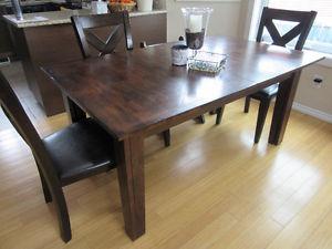 Dark brown dining table for sale very good condition