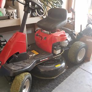 Small ride on lawn mower