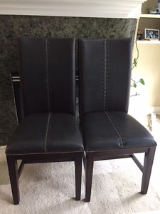 Two Brown Leather Dining Chairs for $150 OBO