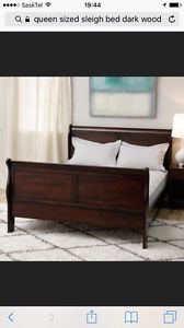 Wanted: Looking for:queen dark wood sleigh bed or