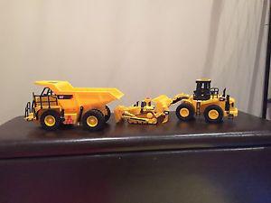 Caterpillar & Cat Dump Truck & Loader