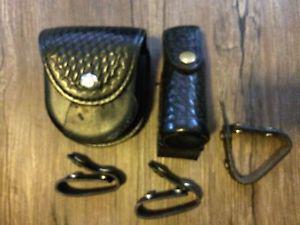 Handcuff and pepper spray holster plus belt clips