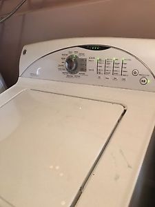 Washer and dryer brand new less then and year old