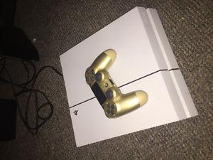 White Playstation 4 with gold controller