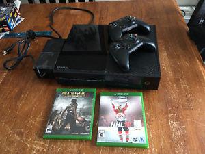 Xbox one with two games and controllers