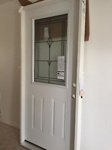 Brand new 36" white exterior door with window